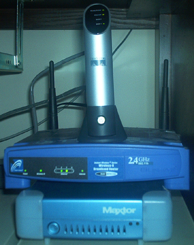 My NSLU2, Linksys wireless router, and Maxtor USB 2.0 Hard Drive.